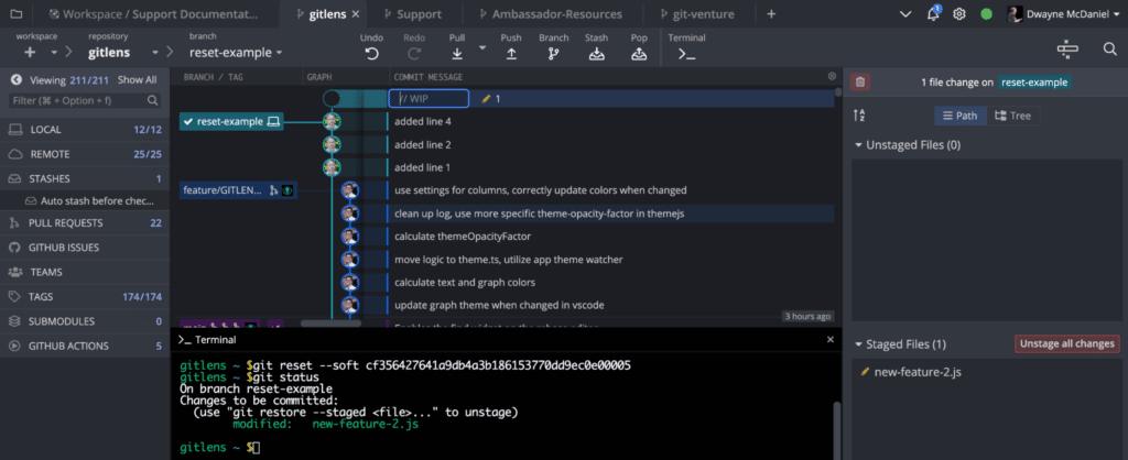 Running git reset –soft 4a91c283 in the terminal and then running a Git Status to show the file feature.js as modified and staged. Using the GitKraken CLI.