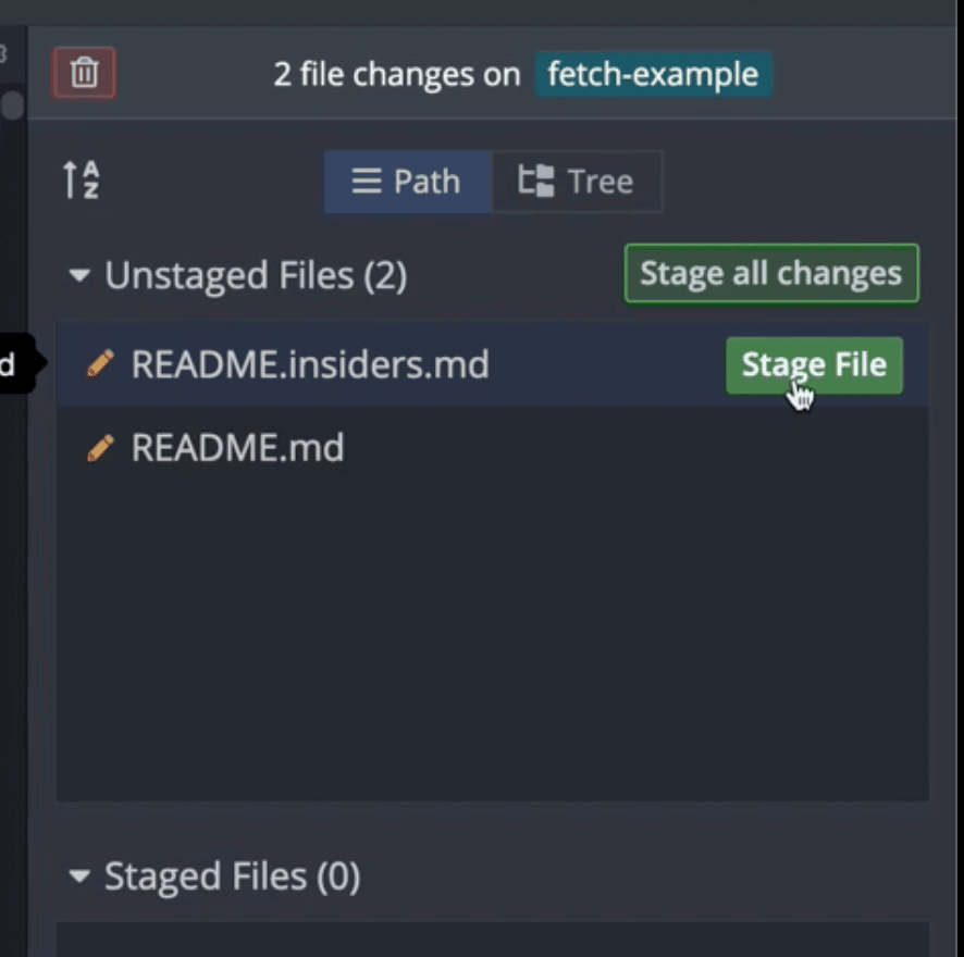Clicking the stage file button for a single file called README.insiders.md in GitKraken Client.